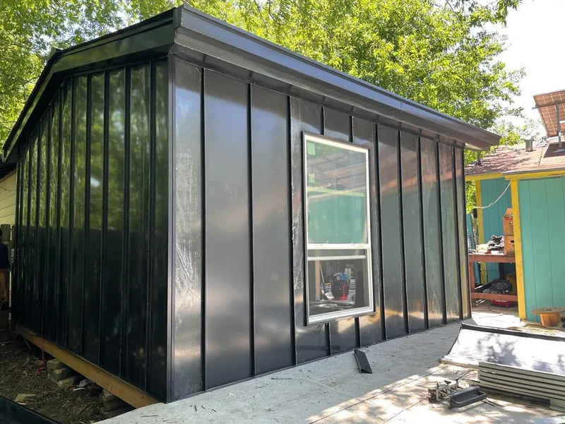 Black standing seam metal wall panels for Metal Roof Installation in Lemay